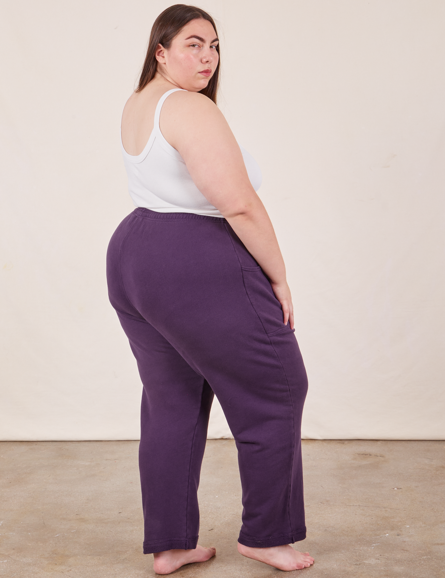 Angled view of Cropped Rolled Cuff Sweatpants in Nebula Purple on Marielena