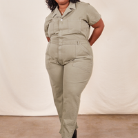 Morgan is 5’5” and wearing 2XL Short Sleeve Jumpsuit in Khaki Grey