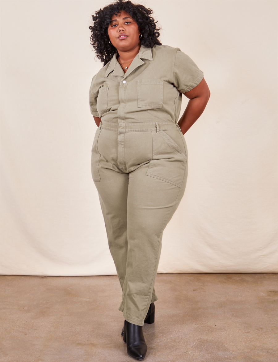 Morgan is 5’5” and wearing 2XL Short Sleeve Jumpsuit in Khaki Grey