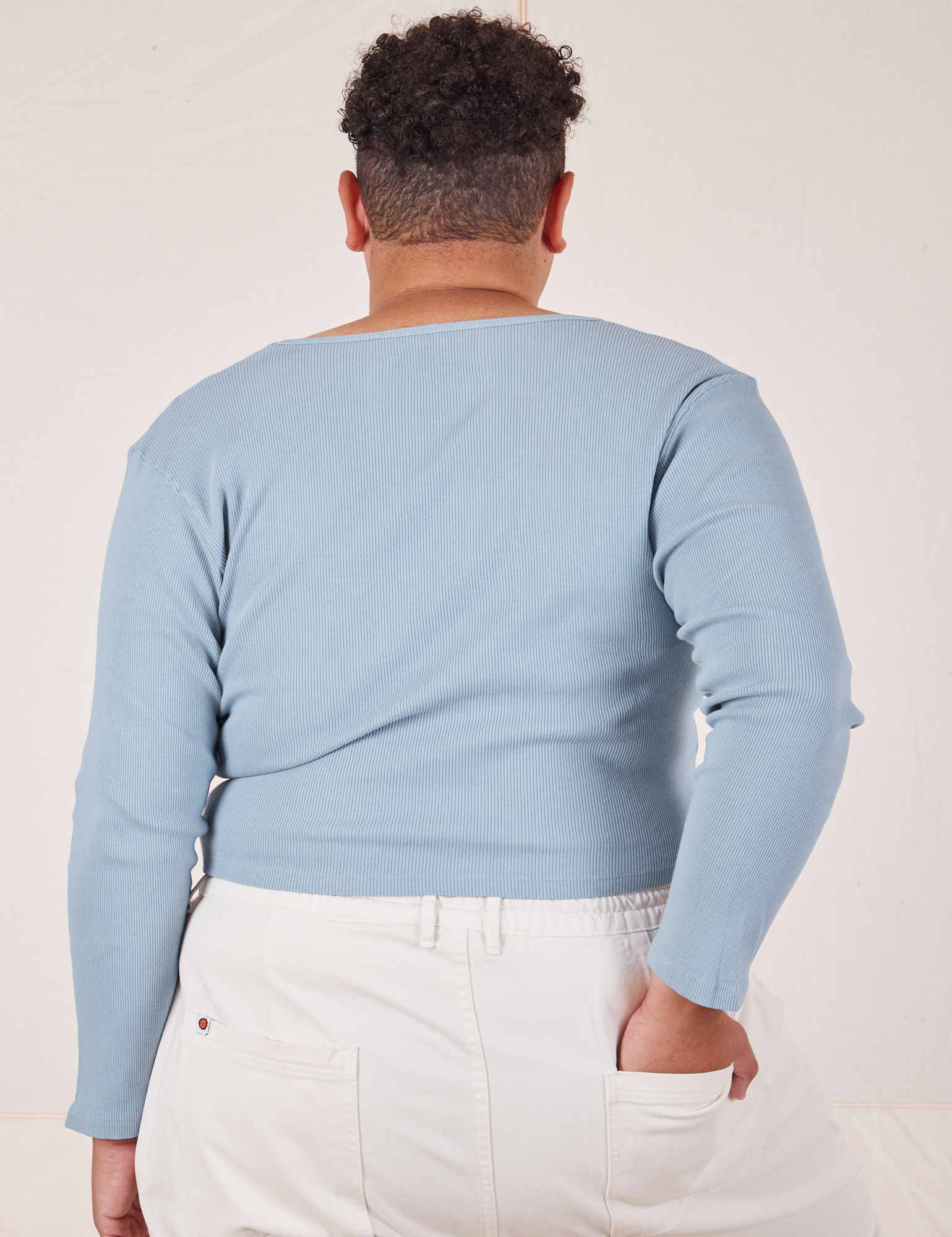 Back view of Long Sleeve V-Neck Tee in Periwinkle on Miguel