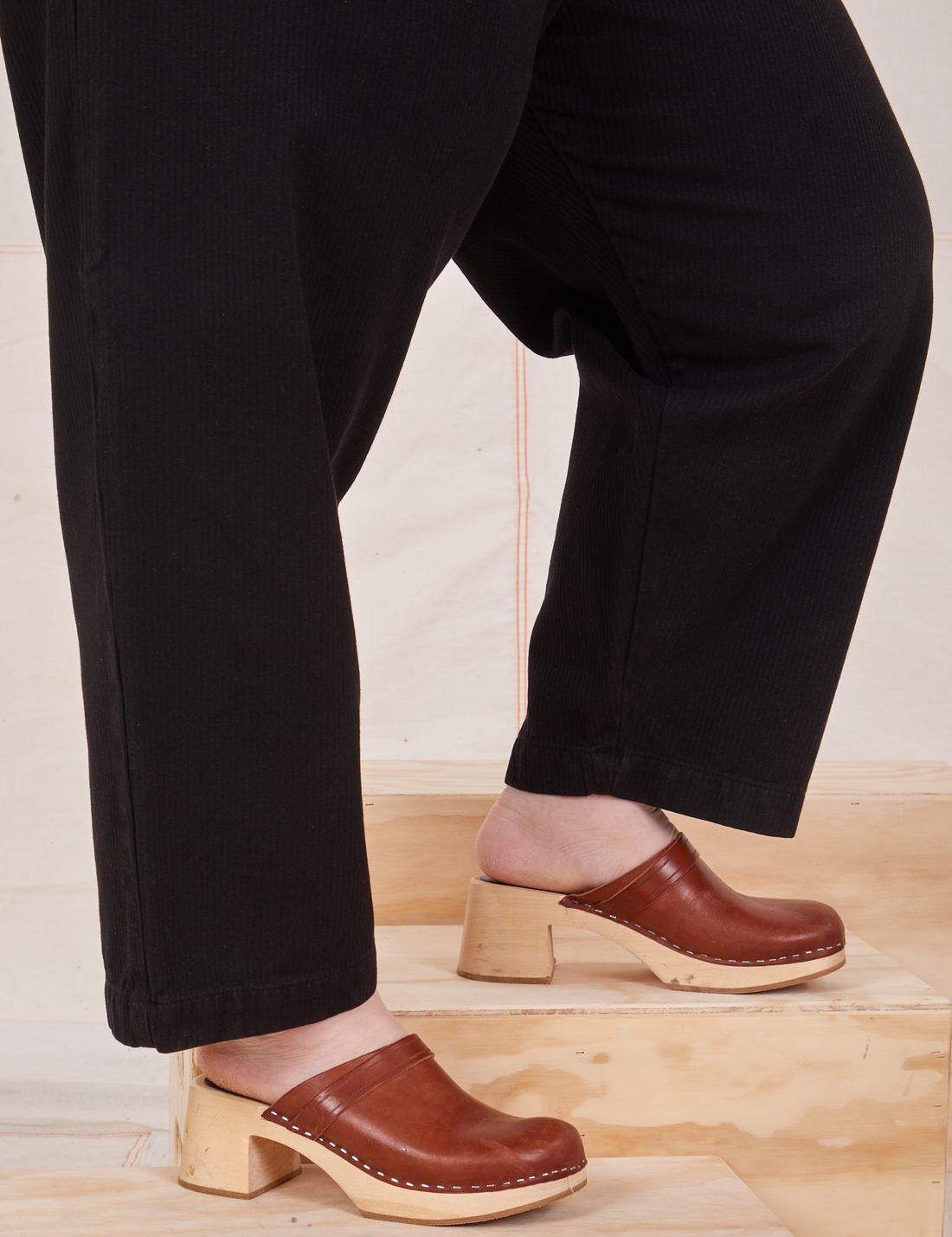 Heritage Trousers in Basic Black side view pant leg close up on Ashley