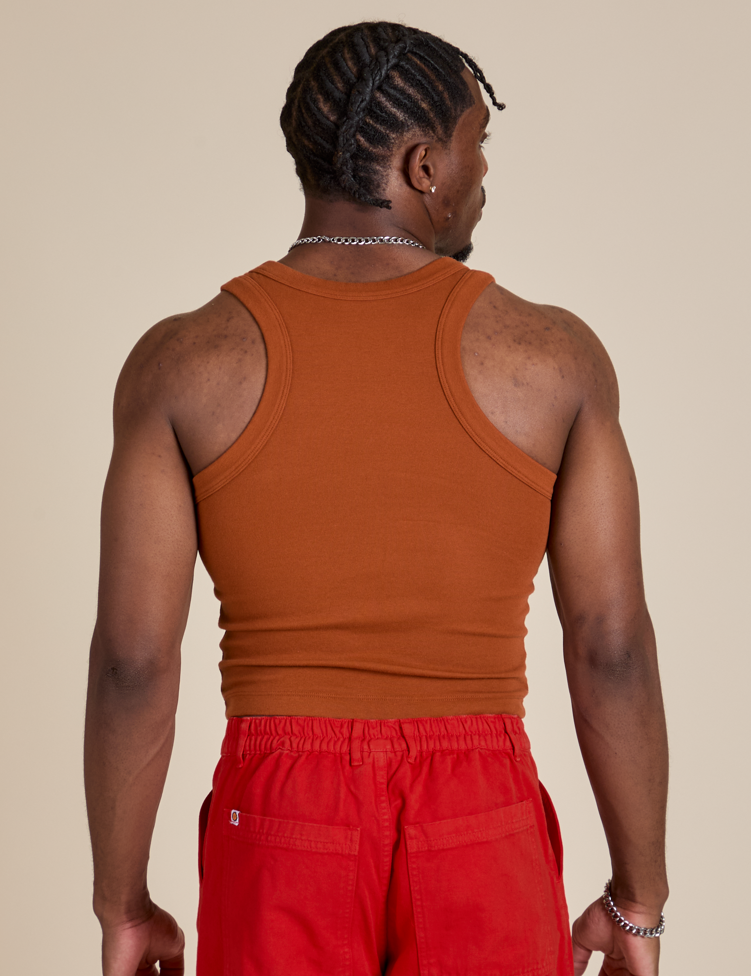 Racerback Tank in Burnt Terracotta back view on Isaac