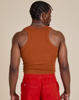 Racerback Tank in Burnt Terracotta back view on Isaac