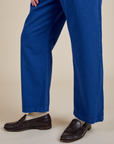 Short Sleeve Jumpsuit in Royal Blue pant leg close up on Quinn