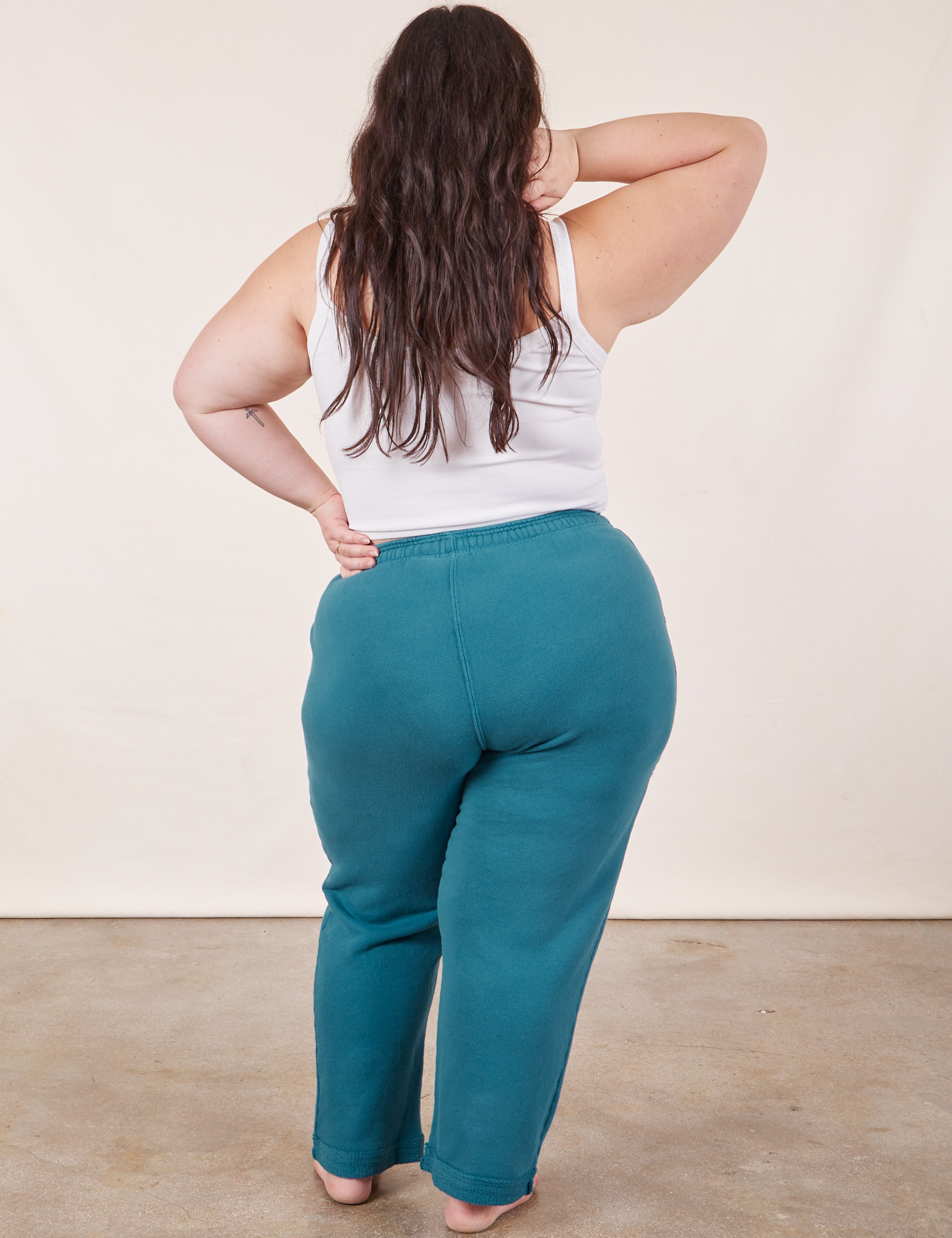 Back view of Cropped Rolled Cuff Sweatpants in Marine Blue on Ashley