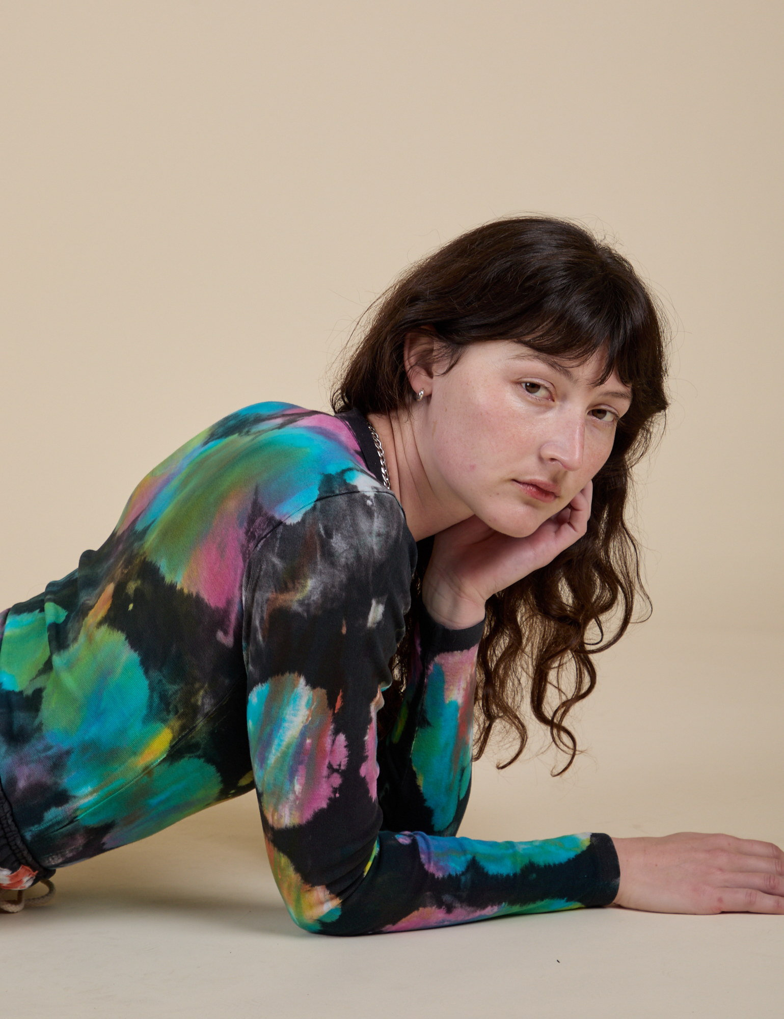 Long Sleeve Baby Tee in Rainbow Magic Waters worn by Alex