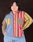 Ashley is wearing a buttoned up Cropped Overshirt in Mixed Stripe