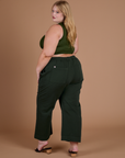 Action Pants in Swamp Green back view on Juliet