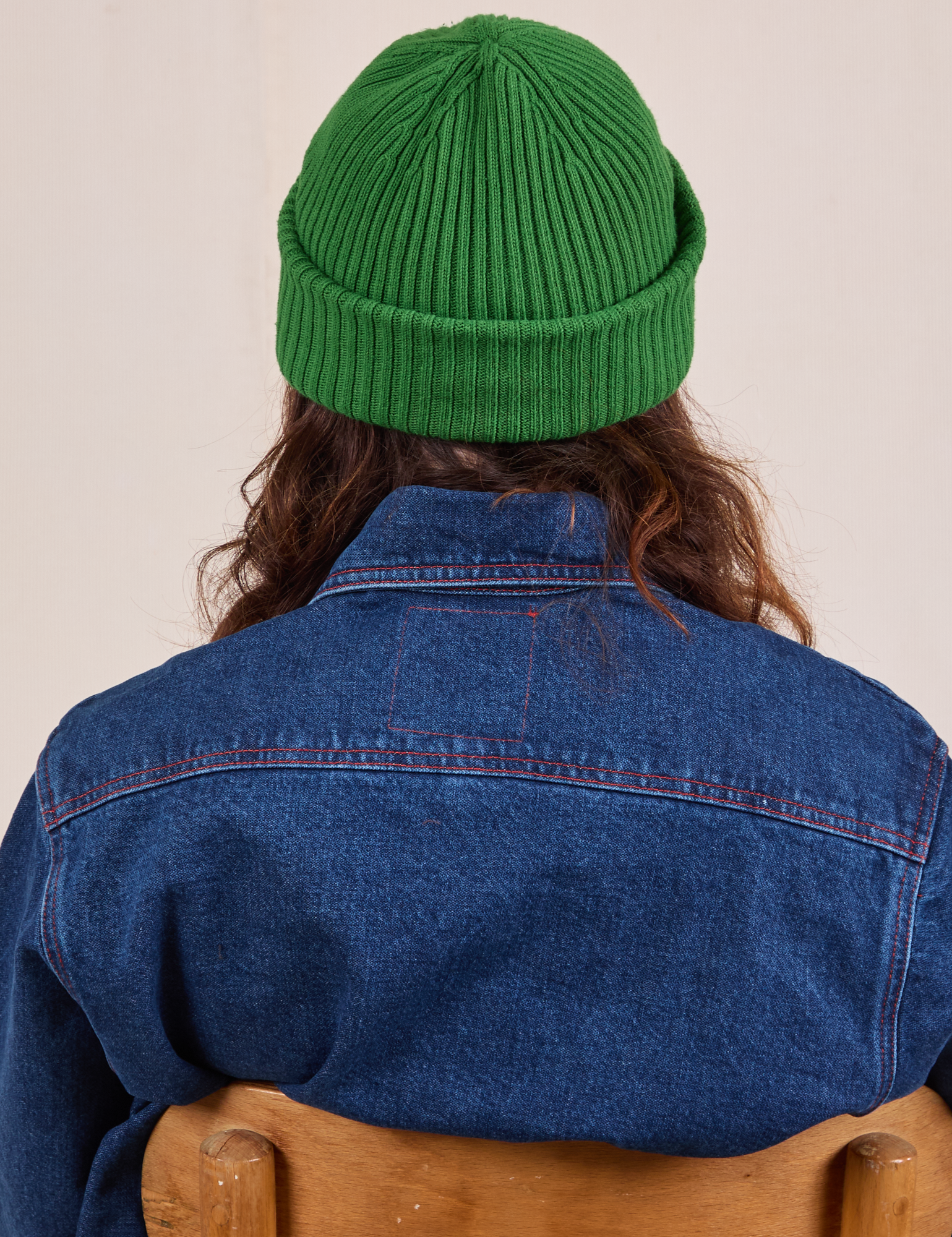 Ribbed Beanie in Forest Green back view on Alex