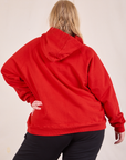 Oversized Hoodie in Mustang Red back view on Juliet