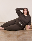 Marielena is wearing Cropped Rolled Cuff Sweatpants in Espresso Brown and matching Heavyweight Crew Sweatshirt