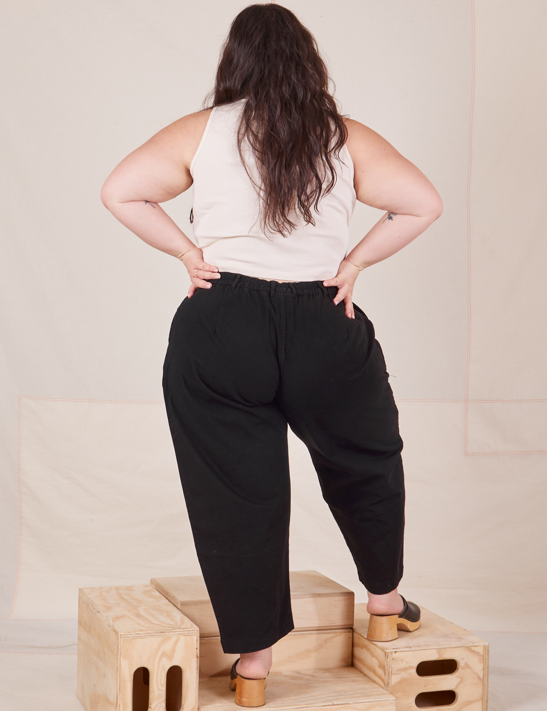 Back view of Heavyweight Trousers in Basic Black worn by Ashley.
