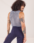 Back view of Mesh Tank Top in Periwinkle and navy Western Pants worn by Jesse