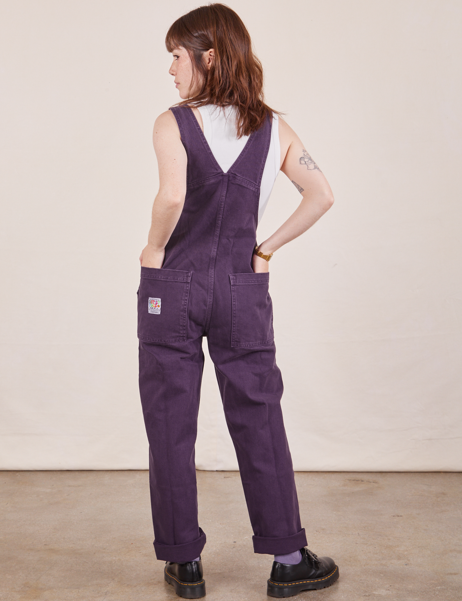 Back view of Original Overalls in Mono Nebula Purple worn by Hana