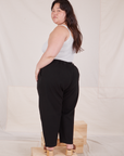 Back view of Heritage Trousers in Basic Black worn by Ashley