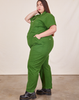 Side view of Short Sleeve Jumpsuit in Lawn Green worn by Marielena