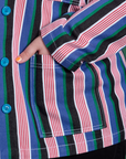 Close up of Juliet's hand in the front pocket of Stripe Work Jacket in Pacific Stripe