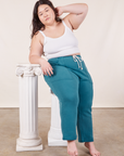 Ashley is wearing Cropped Rolled Cuff Sweatpants in Marine Blue and vintage off-white Cami