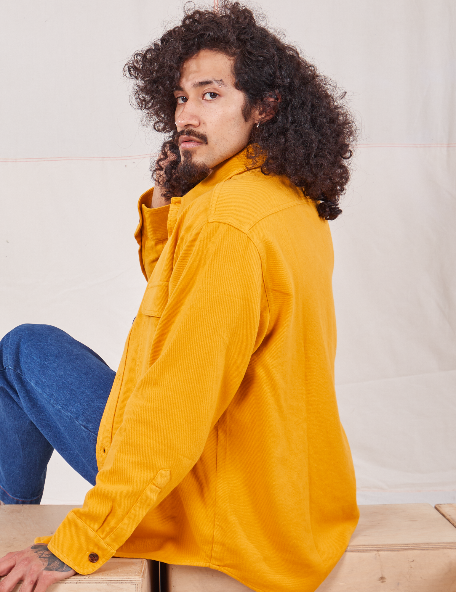 Side view of Flannel Overshirt in Mustard Yellow on Jesse