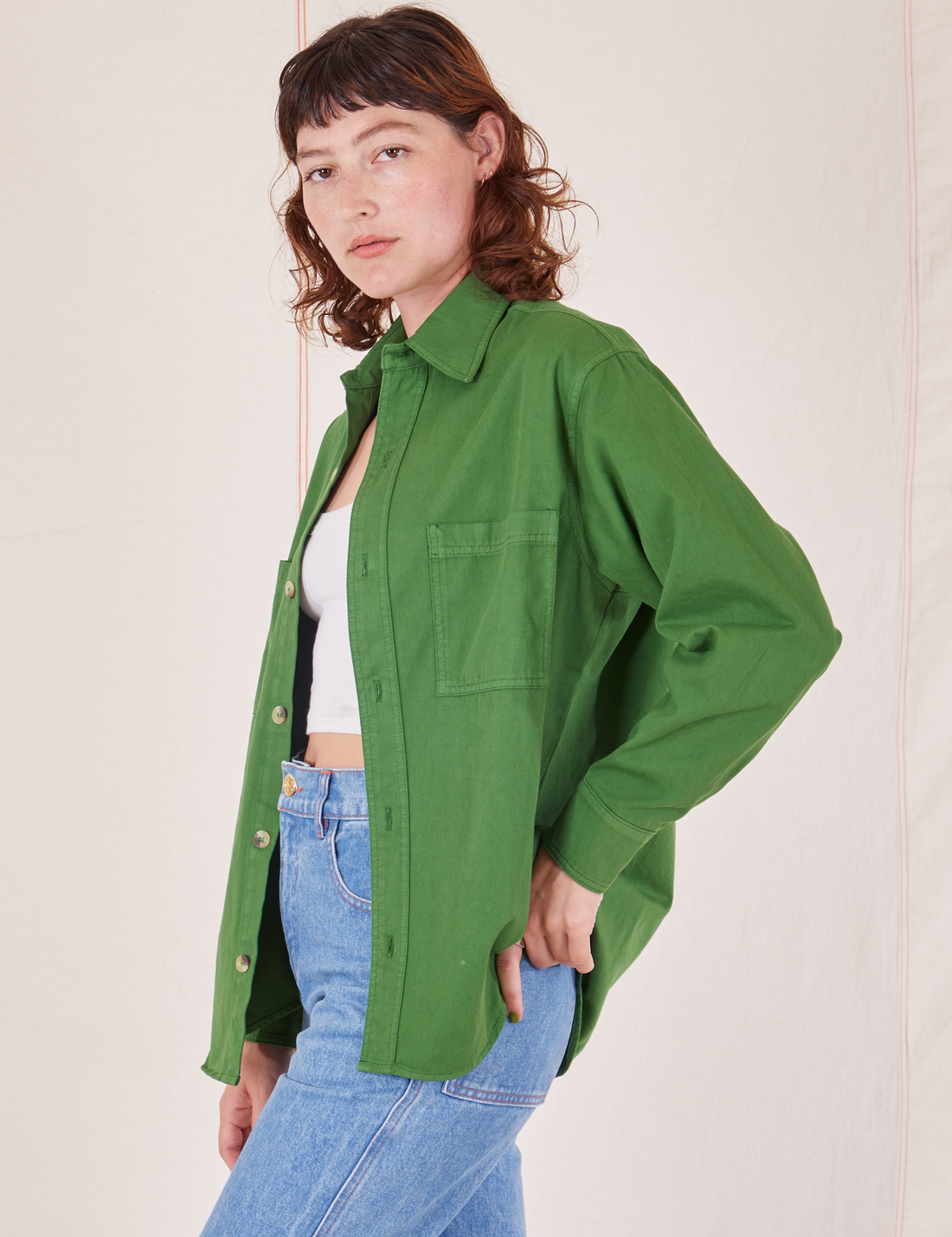 Side view of Oversize Overshirt in Lawn Green worn by Alex
