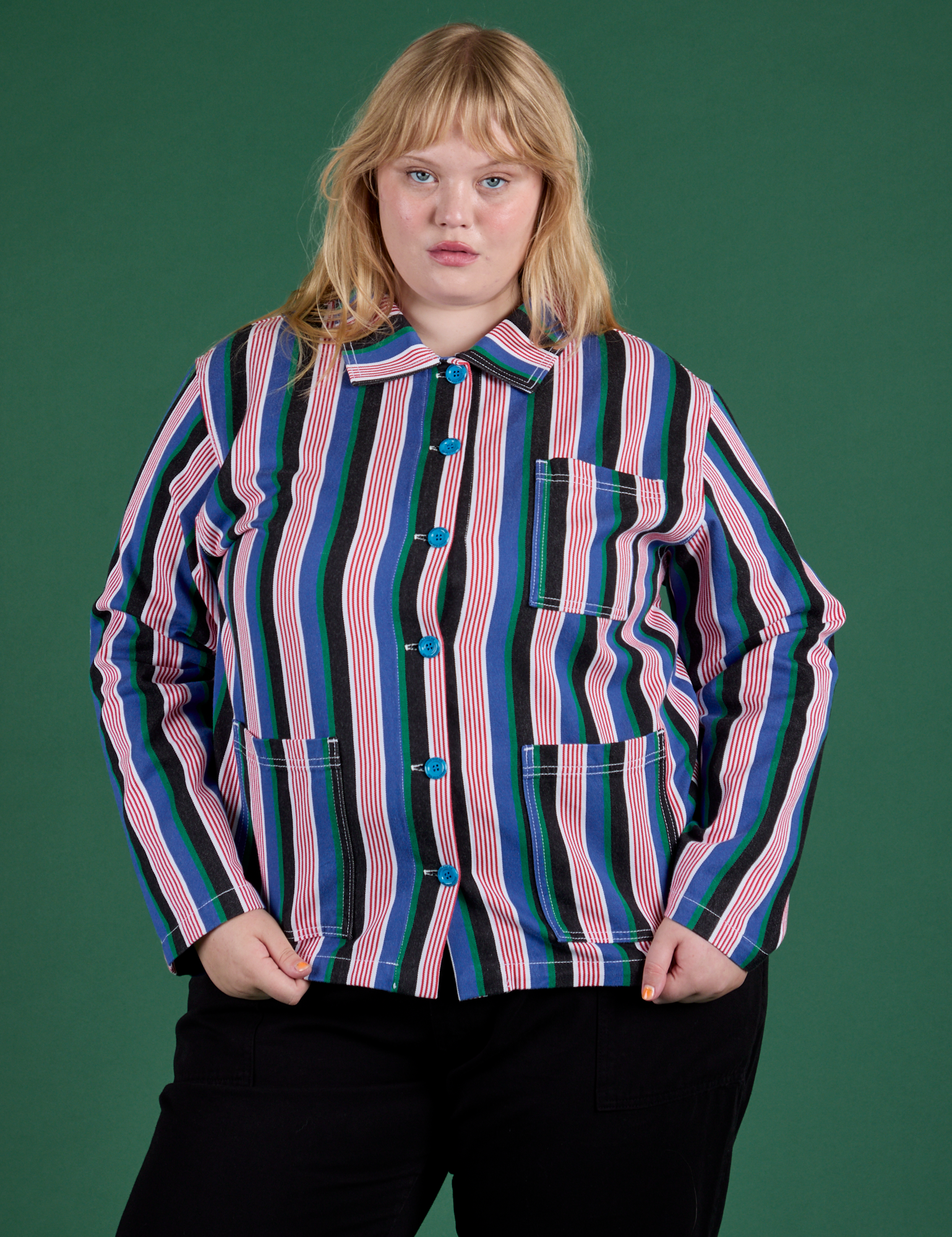 Juliet is wearing a buttoned up Stripe Work Jacket in Pacific Stripe