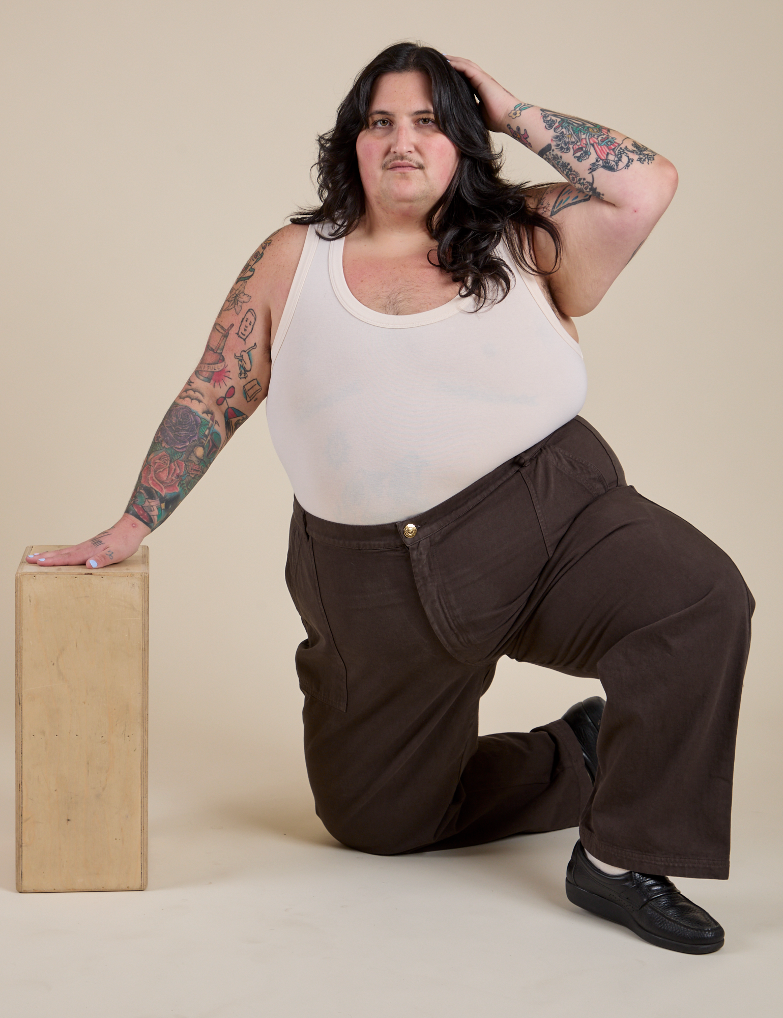 Work Pants in Espresso Brown and Tank Top in Vintage Tee Off-White worn by Sam