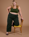 Action Pants in Swamp Green and evergreen Mini Tank worn by Juliet