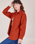 Angled side view of Oversize Overshirt in Paprika on Alex