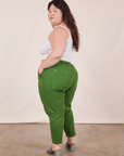 Angled view of Petite Pencil Pants in Lawn Green on Ashley