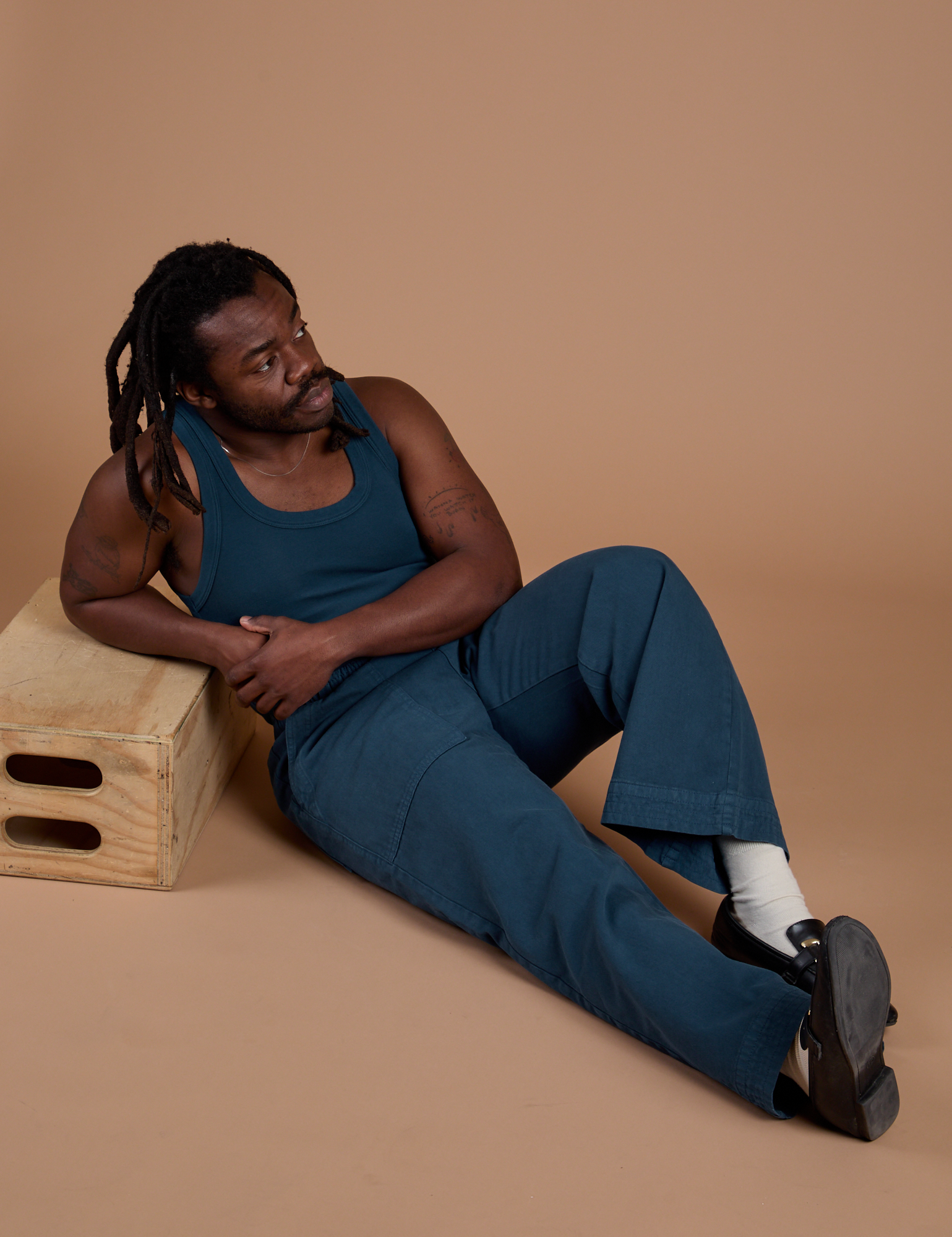 Demi is wearing Action Pants in Lagoon and Tank Top in Lagoon