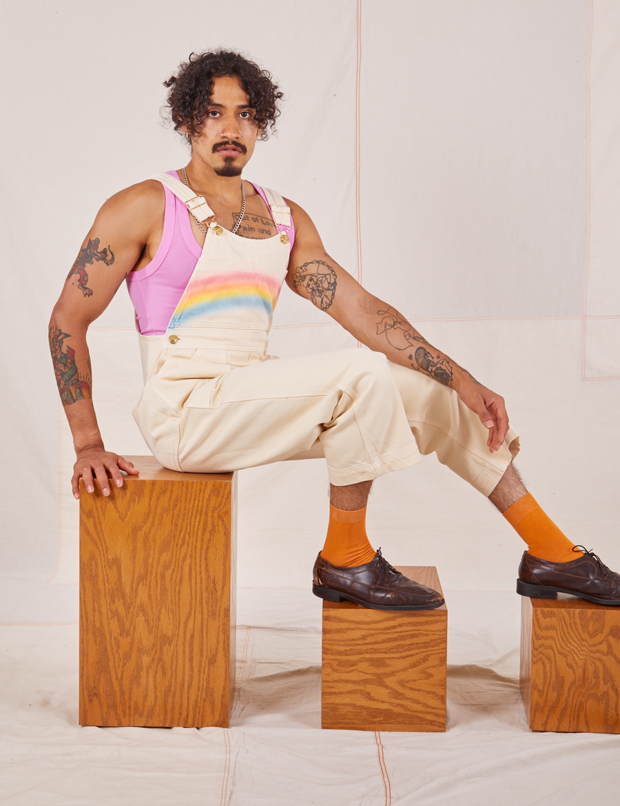 Jesse is wearing Rainbow Overalls and bubblegum pink Cropped Tank Top
