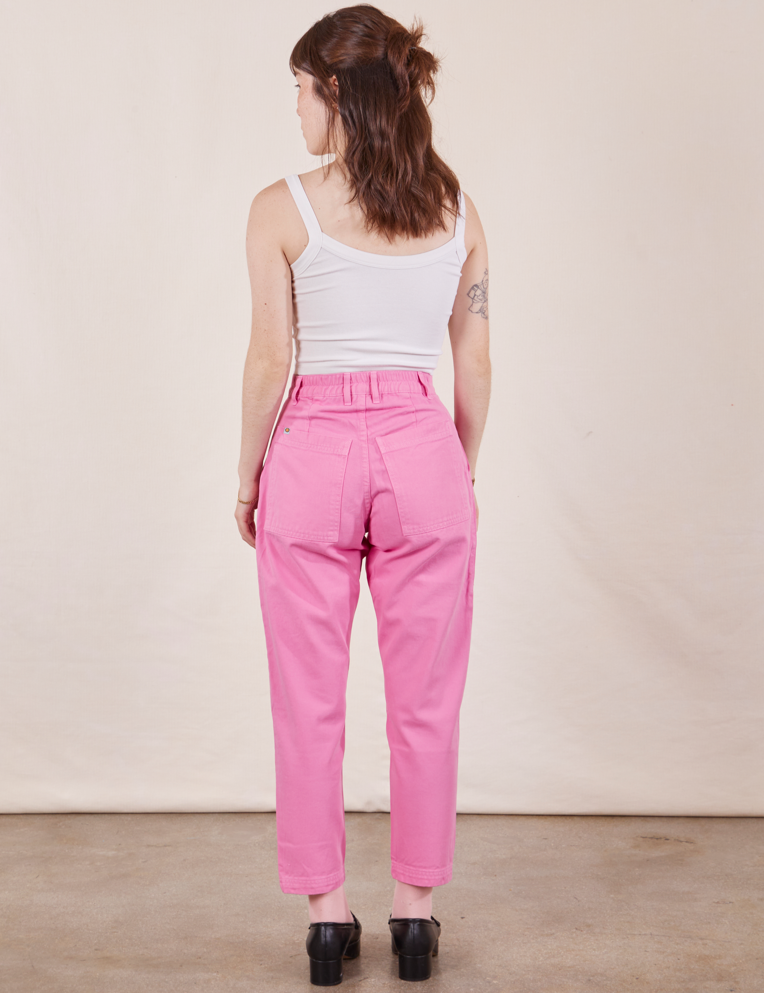 Back view of Petite Pencil Pants in Bubblegum Pink and vintage off-white Cropped Cami on Hana