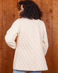 Back view of Quilted Overcoat in Vintage Off-White on Jesse