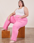Marielena is wearing Cropped Rolled Cuff Sweatpants in Bubblegum Pink and vintage off-white Cropped Tank Top