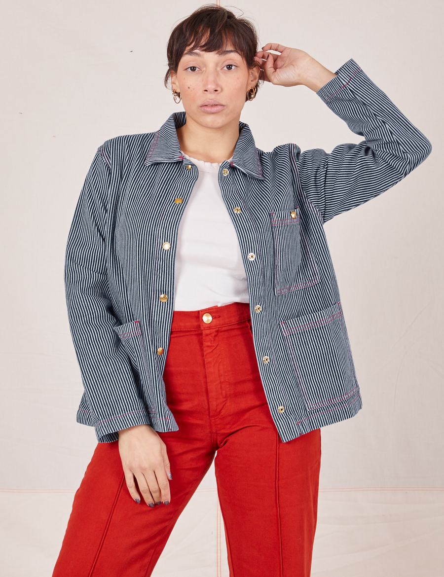 Railroad Stripe Denim Work Jacket and paprika Western Pants worn by Tiara