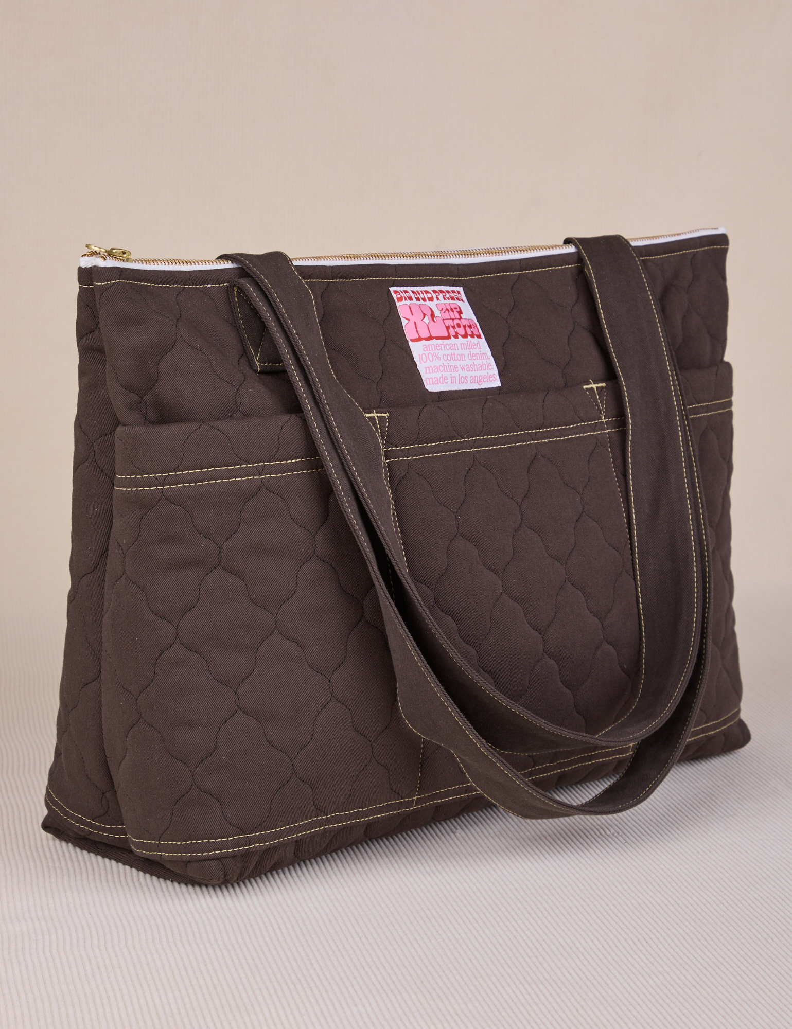 Angled view of Quilted XL Tote in Espresso Brown