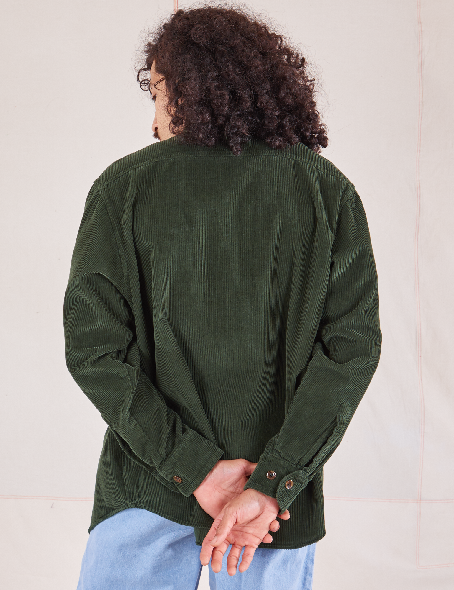Corduroy Overshirt in Swamp Green back view on Jesse