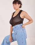 Side view of Mesh Tank Top in Basic Black and light wash Sailor Jeans worn by Tiara