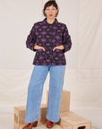 Tiara is wearing  Purple Tile Jacquard Work Jacket and light wash Frontier Jeans