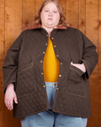 Catie is 5'11" and wearing 5XL Quilted Overcoat in Espresso Brown