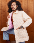 Angled front view of Quilted Overcoat in Vintage Off-White on Jesse