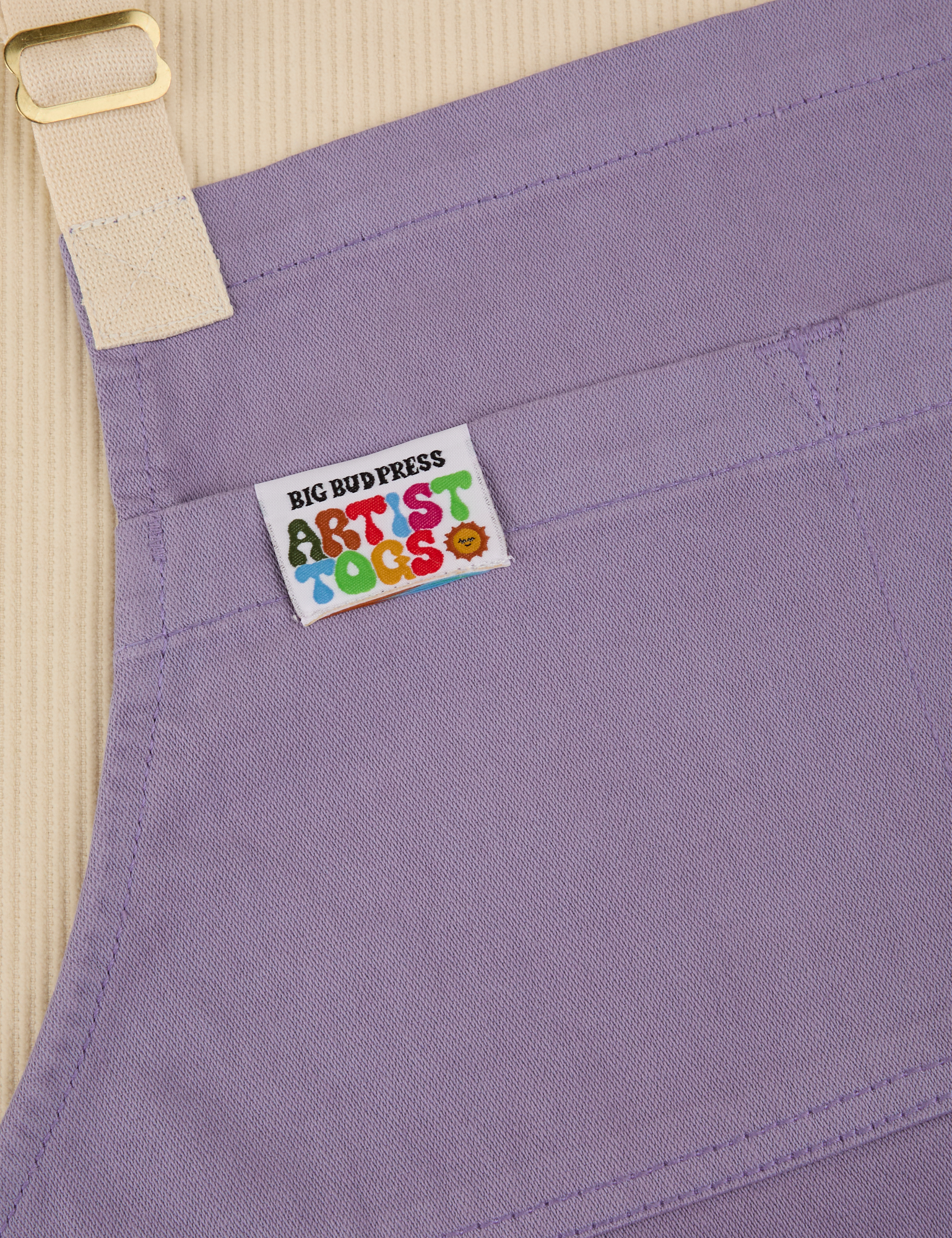 Full Denim Apron in Faded Grape close up