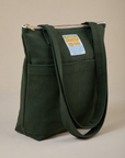 Angled view of Over-Shoulder Zip Mini Tote in Swamp Green