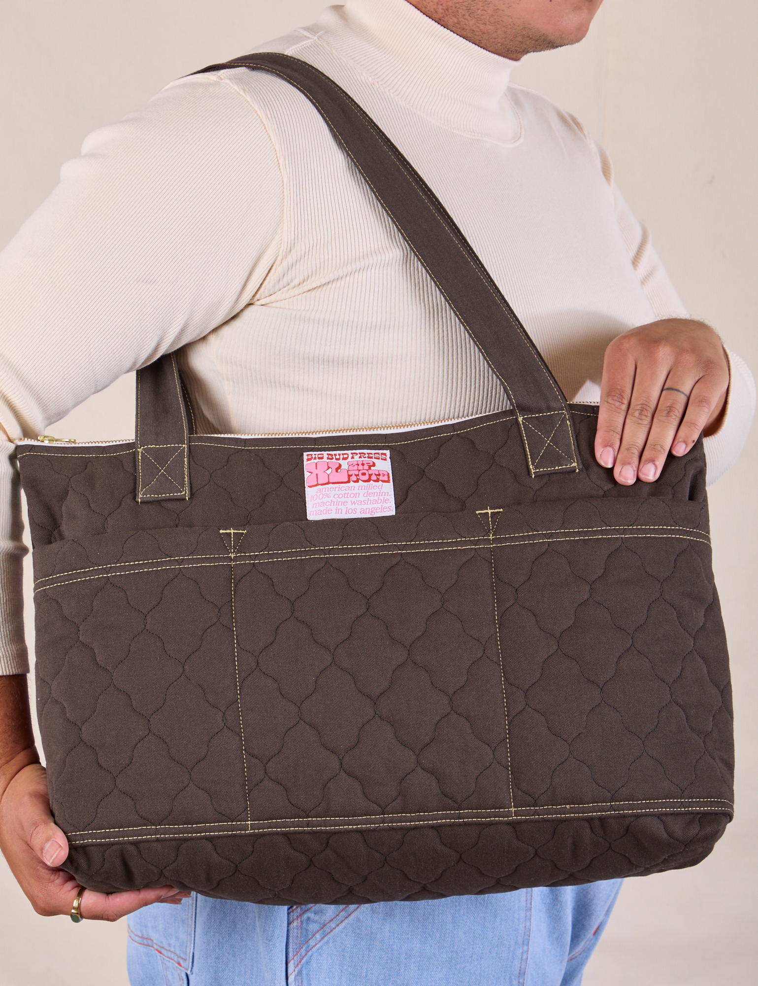 Quilted XL Tote in Espresso Brown worn on model&#39;s shoulder