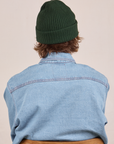 Ribbed Beanie in Swamp Green back view worn by Quinn