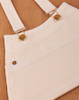 Overall Handbag in Vintage Off-White. Brass sun baby buttons and hardware