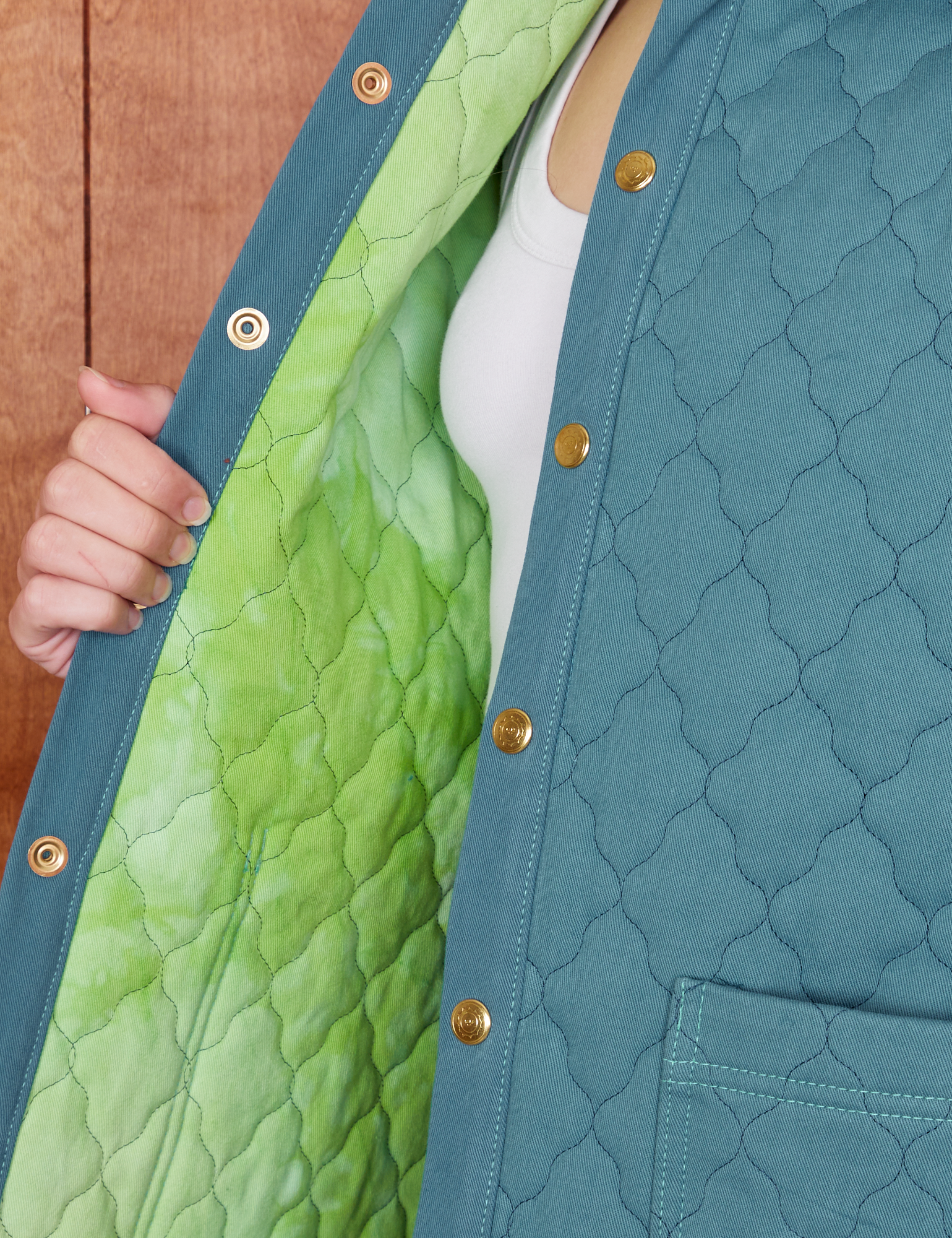 Interior close up of Quilted Overcoat in Marine Blue on Alex