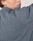 Back shoulder close up of Railroad Stripe Denim Work Jacket worn by Tiara