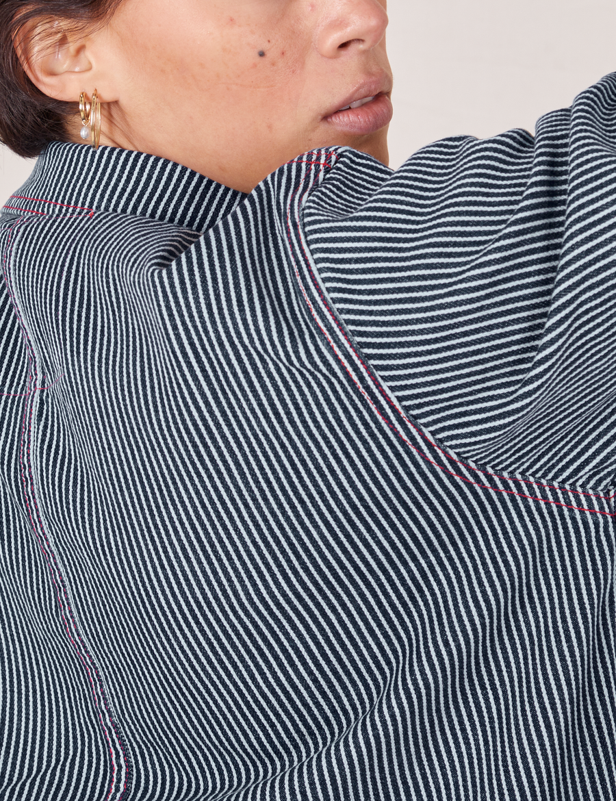 Back shoulder close up of Railroad Stripe Denim Work Jacket worn by Tiara