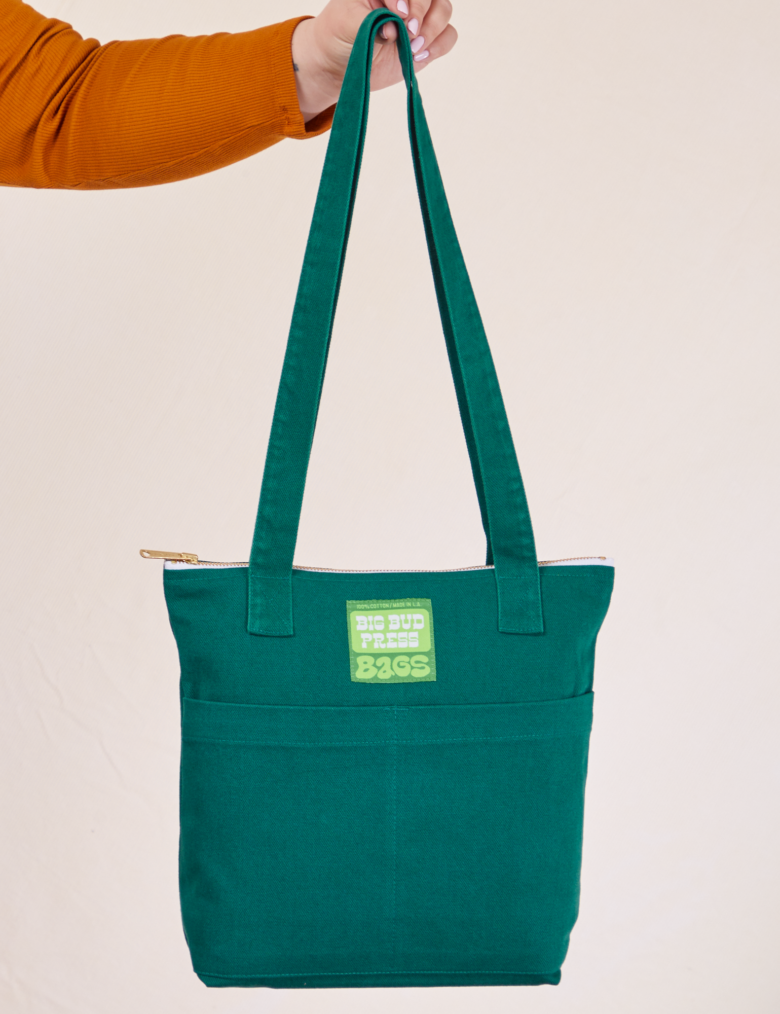 Over-Shoulder Zip Mini Tote in Hunter Green held by model